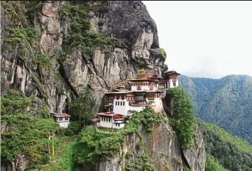  ??  ?? For the adventurou­s and determined, be prepared for the high steep climb up the famous monastery Taktsang, the Tiger’s Nest.