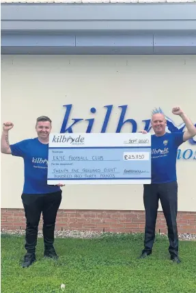  ??  ?? Proud moment Mark Howarth from EKYC hands over a cheque to Kilbryde Hospice chief executive Gordon McHugh