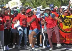  ?? TRACEY ADAMS African News Agency (ANA) ?? SAMWU members march on May Day. The union is angry about JP Smith’s comments on firefighte­rs’ working condition. |