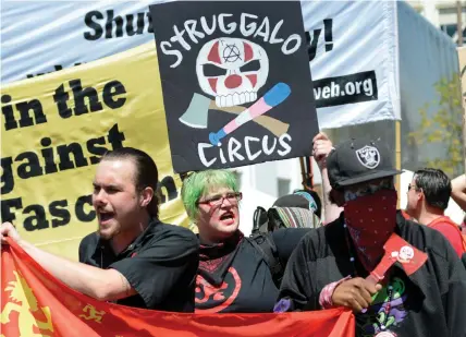  ??  ?? COUNTERPRO­TESTERS RALLY at a canceled No Marxism in America event in Berkeley, California.