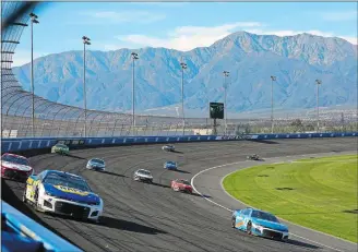  ?? MARCIO JOSE SANCHEZ/AP PHOTO ?? In this Feb. 27, 2022, file photo, Chase Elliott, top left, leads a group during the NASCAR Cup race at Auto Club Speedway in Fontana, Calif.