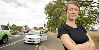  ?? CHRISTEL YARDLEY/STUFF ?? Hamilton city councillor Sarah Thomson and her son Leo had a recent close call with a scooter rider on a city footpath.