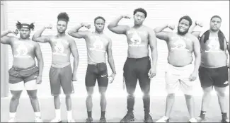  ??  ?? Mustang Football iron team members