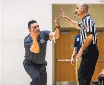  ?? JOURNAL FILE PHOTO ?? APS athletic director Adrian Ortega argues a call with an official during his days as the basketball coach at Atrisco Heritage.