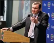  ?? ALAN YOUNGBLOOD— STAR-BANNER VIA AP ?? Dan Mullen, the new head football coach at the University of Florida, is introduced during a news conference in Gainesvill­e, Fla., on Monday.