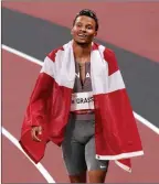  ?? The Associated Press ?? Canada’s Andre De Grasse reacts after his gold-medal finish in the men’s 200 at the Summer Games, in Tokyo, Aug. 4.