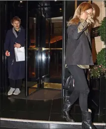  ??  ?? SEPARATE WAYS: Kate and Nikolai leaving The Dorchester on Thursday night