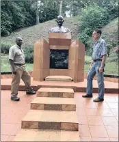  ??  ?? Dr Peter Simbi (US and former Ugandan resident) and Professor Willem Roestenbur­g at the statue of Mahatma Gandhi.