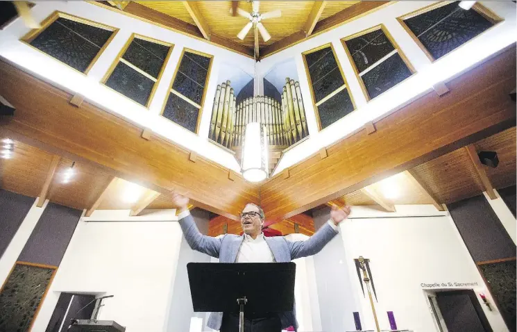  ?? CODIE MCLACHLAN ?? Artistic director Laurier Fagnan, shown leading a Chorale Saint-Jean rehearsal, says it is powerful to experience the transforma­tion of individual voices into a collective.