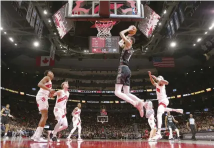  ?? AGENCE FRANCE PRESSE ?? TORONTO, CANADA: Victor Wembanyama #1 of the San Antonio Spurs drives to the basket during the game against the Toronto Raptors at the Scotiabank Arena in Toronto, Ontario, Canada.