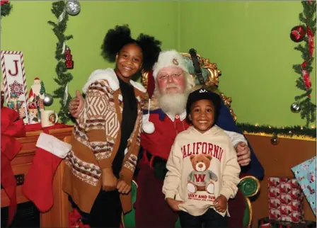  ?? PHOTO BY KREST WINCHESTER ?? Kids visit Santa Claus at Wintertime Wonderland.