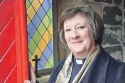  ??  ?? Provost for St John’s Cathedral Margi Campbell welcomes all to Winter Praise.