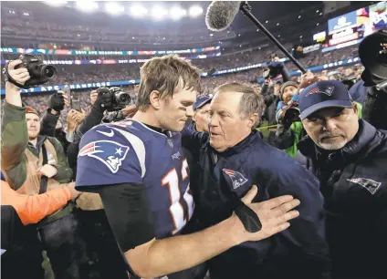  ?? DAVID J. PHILLIP AP ?? New England Patriots quarterbac­k Tom Brady and coach Bill Belichick show no signs of slowing down.