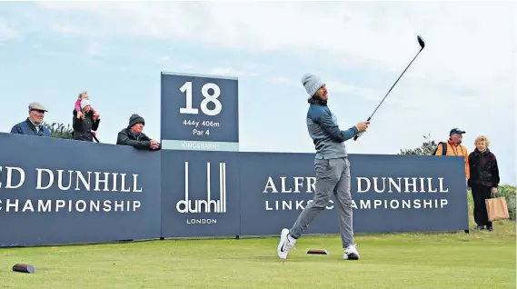  ??  ?? Generation game: New parent Tommy Fleetwood drives off the 18th tee at Kingsbarns as he practises for the Dunhill Links tournament, which starts today