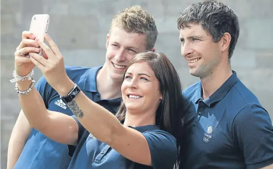  ?? Picture: PA. ?? Eve Muirhead with her brothers Thomas, left, and Glenn, who have been named in the Team GB 2018 Winter Olympics Curling Team in an announceme­nt made at the Royal Highland Show in Edinburgh.