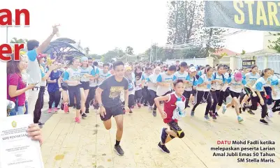  ??  ?? DATU Mohd Fadli ketika melepaskan peserta Larian Amal Jubli Emas 50 Tahun SM Stella Maris.