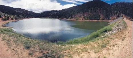  ?? LUIS SÁNCHEZ SATURNO/THE NEW MEXICAN ?? Despite Monday’s storm, Nichols Reservoir, the smaller of the city’s two reservoirs, is at 63.28 percent capacity.