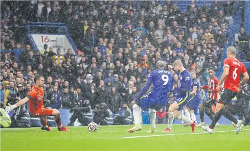  ?? REUTERS ?? Chelsea’s Timo Werner, fourth right, scores their second goal against Southampto­n at Stamford Bridge.