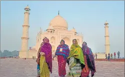  ?? . PTI PHOTO ?? People wearing warm clothes visit the Taj Mahal during World Heritage Week 2022, in Agra on Sunday.