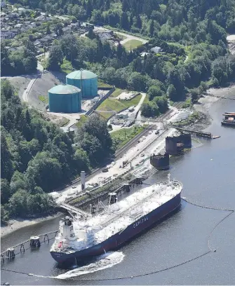  ?? THE CANADIAN PRESS ?? A aerial view of Kinder Morgan’s Trans Mountain marine terminal in Burnaby. Alberta and B.C. First Nations will meet on July 25 in Vancouver to discuss an ownership stake in the controvers­ial Trans Mountain pipeline expansion project