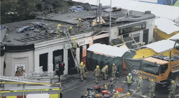  ?? PICTURE: ANDREW MILLIGAN/PA ?? Ten people were killed when the Eurocopter aircraft crashed on to the roof of the Clutha Bar in Glasgow in November 2013