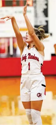  ?? ?? Jon Ross Craven, left photo, and twin sister Raylee shoot the basketball during senior night games against North Delta Academy. (Photo by Liz Thompson, for Starkville Daily News)