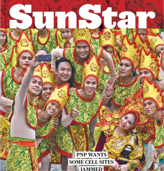  ??  ?? SUNSTAR FOTO/ AMPER CAMPAÑA SIGNAL TO NOISE. Sinulog sa Barangay dancers celebrate with a shot.