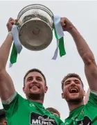  ??  ?? Moorefield captain Daryl Flynn (left) lifts the Dermot Bourke Cup with his team-mate David Whyte and, below, Whye is shown a red card in the first half