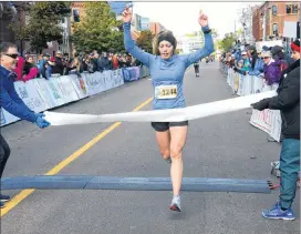  ?? JASON MALLOY/SALTWIRE NETWORK ?? Amber Spriggs won the Grant Thornton Full Marathon women’s title Sunday morning in Charlottet­own.