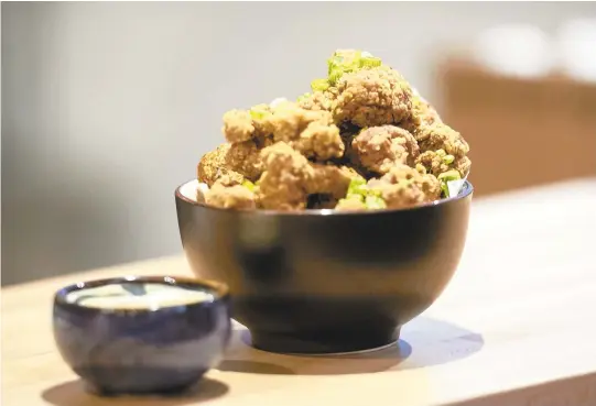  ?? HANNAH RUHOFF PHOTOS /STAFF ?? The karaage, Japanese chicken nuggets, served with Japanese mayonnaise.