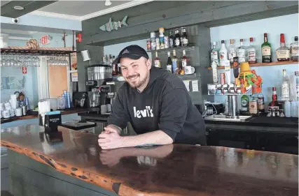  ?? DEB CRAM/PORTSMOUTH HERALD ?? Tanner Goff is the new chef and general manager of Nick's Beachside Grille in York Beach.