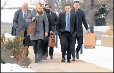 ?? KYLE TELECHAN/POST-TRIBUNE ?? James Snyder arrives with his representa­tion to his trial at the federal courthouse in Hammond on Jan. 14.
