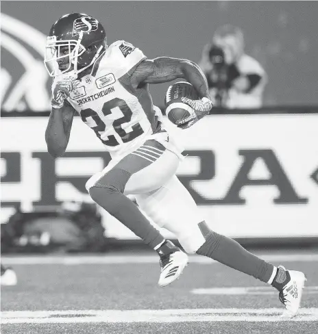  ?? MARK BLINCH/THE CANADIAN PRESS. ?? The Roughrider­s’ Christion Jones takes off on a 61-yard punt-return touchdown on July 19 in Hamilton.