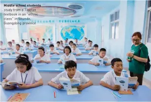  ??  ?? Middle school students study from a Tibetan textbook in an “ethnic class” in Shunde, Guangdong province