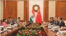  ?? Reuters - Madoka Ikegami/Pool via ?? ENGROSSED: Indian Foreign Minister Sushma Swaraj and Chinese Foreign Minister Wang Yi attend a meeting at the Diaoyutai State Guest House in Beijing, China, April 22, 201 8.