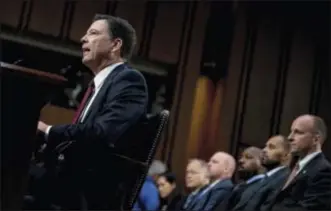  ??  ?? Former FBI director James Comey speaks during a Senate Intelligen­ce Committee hearing on Capitol Hill Thursday in Washington.