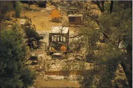  ?? NIC COURY — THE ASSOCIATED PRESS ?? Rubble is left of a home destroyed in the Carmel Fire on Aug. 19.