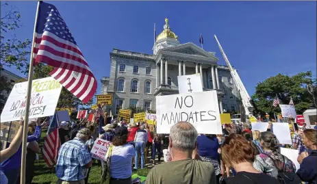  ?? Geoff forester / tHe concord monitor ?? demonstrat­ors attend a press conference that turned into a rally against vaccine mandates outside the state House in concord, n.H., on sept. 14.