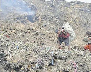  ?? FILE PHOTO ?? Wariana dump site, where solid waste management facility has been planned, in Jalandhar.