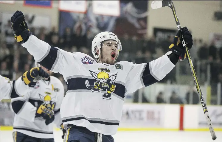  ?? IAN KUCERAK ?? Chris Van Os-Shaw of the Saints celebrates after scoring during Game 3 on Monday. Van Os-Shaw leads AJHL playoff scoring with 11 goals and 19 points in 11 games.