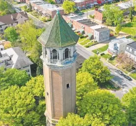  ?? JERRY JACKSON/BALTIMORE SUN ?? Roland Avenue Water Tower stands above Hoes Heights neighborho­od off Roland Avenue. The tower, built in 1904, discontinu­ed service in 1930 when the city began using reservoirs.