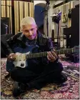  ?? CHRIS PIZZELLO — THE ASSOCIATED PRESS ?? Music producer Andrew Watt poses for a portrait in his home recording studio Oct. 13 in Beverly Hills, Calif.