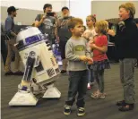  ?? Leah Millis / The Chronicle 2016 ?? An R2-D2 unit like the one in the “Star Wars” films appears at 2016’s Silicon Valley Comic Con in San Jose.