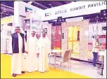  ??  ?? Mohammed Al-Ajmi with Kuwaiti industrial­ists participat­ing in the exhibition.