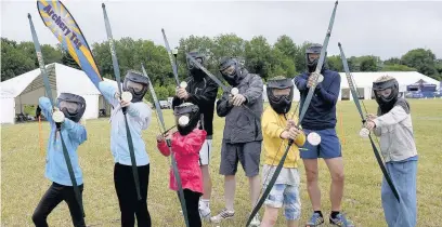  ??  ?? ●●Kitted up and ready for action, children and parents taking part in a game of Archery Tag at GoFest 2015 in Surrey Sports Park, Guildford.