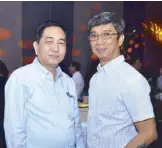  ??  ?? Kuya J Group Inc. purchasing head Perry Sidiangco and Beau Means Business Foundation business developmen­t head Ronaldo Linao.