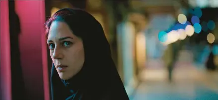  ?? UTOPIA ?? Zar Amir Ebrahimi stars as a journalist investigat­ing a serial killer who is targeting women and sex workers in the Iranian city of Mashhad in “Holy Spider.”