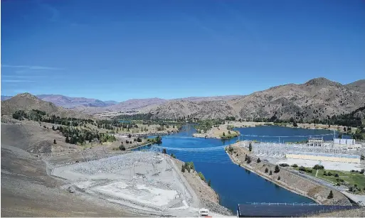  ?? PHOTO:ODT FILES ?? Easing . . . Wholesale electricit­y prices fell in July: pictured, the view looking towards Otematata from the crest of the Benmore dam.