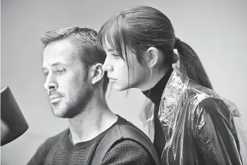  ?? — Stephen Vaughan, Warner Bros. Pictures ?? Ryan Gosling and Ana De Armas in ‘Blade Runner 2049’.