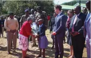  ?? PHOTO SUPPLIED ?? Kenyatta receives flowers from a young student.